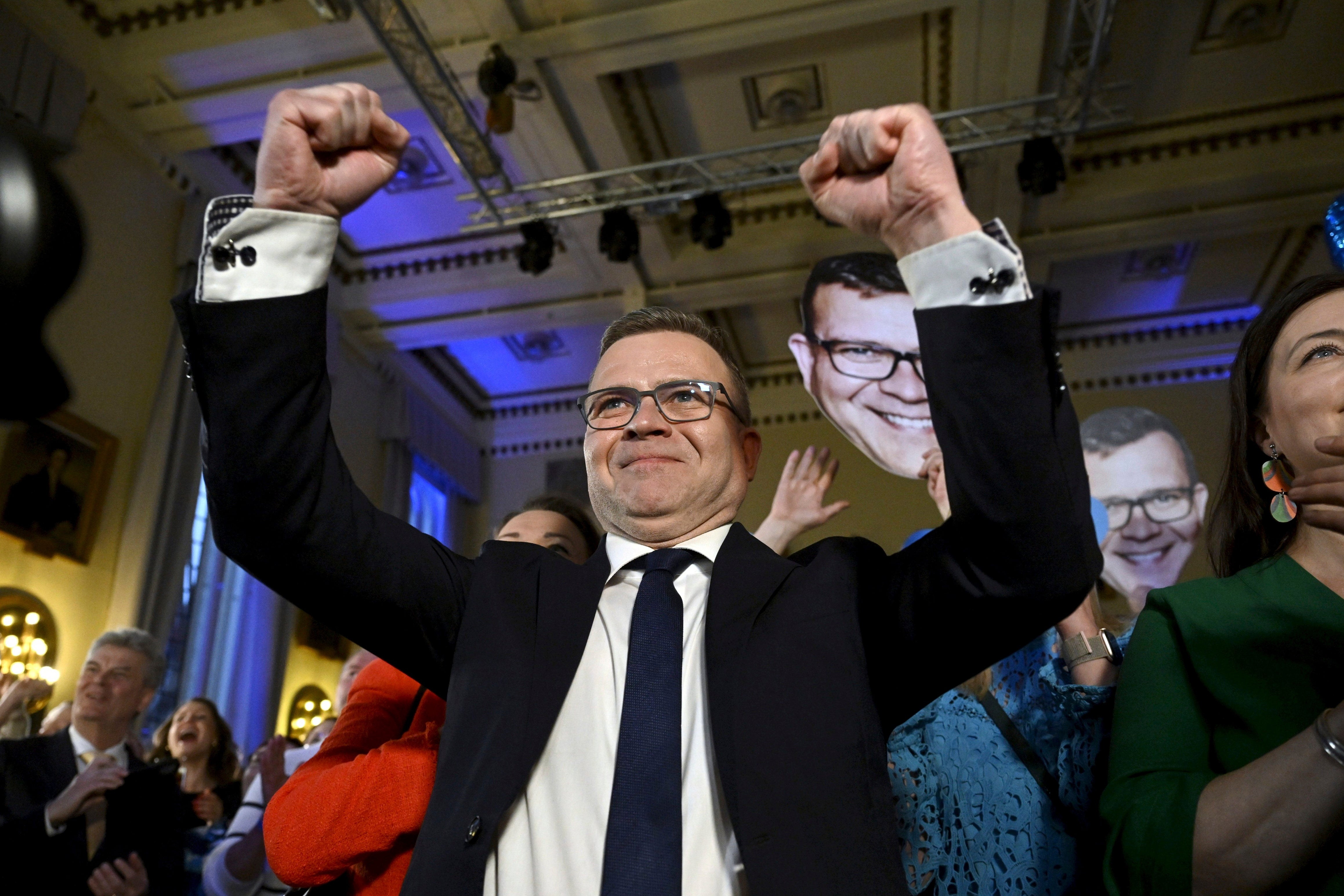 National Coalition Chairman Petteri Orpo celebrates at the party's parliament election