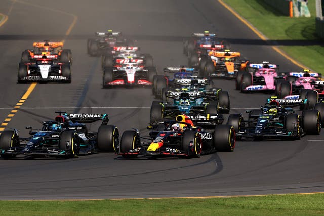 <p>Lewis Hamilton battles with Max Verstappen on lap one</p>