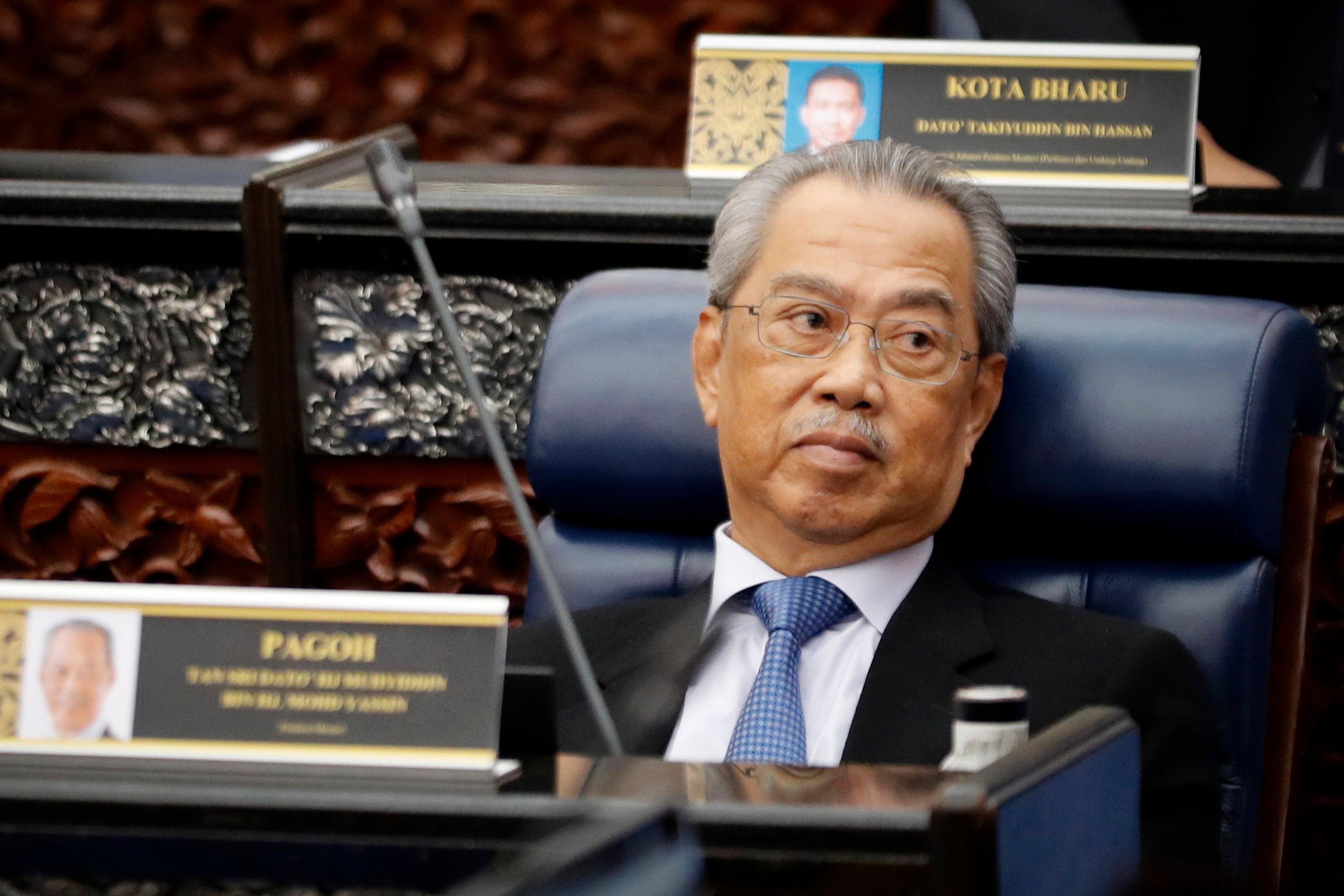 <p>File: Malaysian Prime Minister Muhyiddin Yassin attends a parliament session</p>