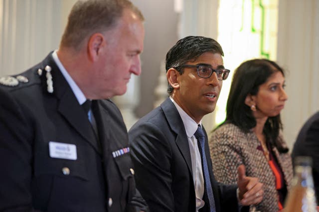 <p>Rishi Sunak and Suella Braverman with police leaders during visit to Rochdale</p>