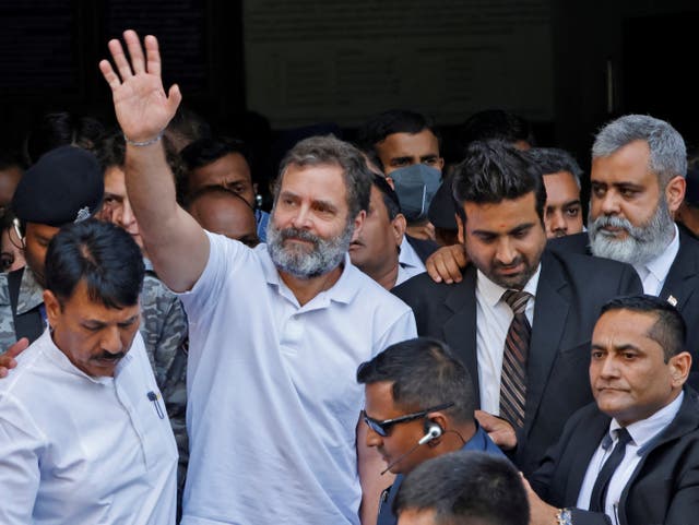 <p>File photo: Rahul Gandhi, a senior leader of India’s main opposition Congress party, waves as he leaves a court</p>
