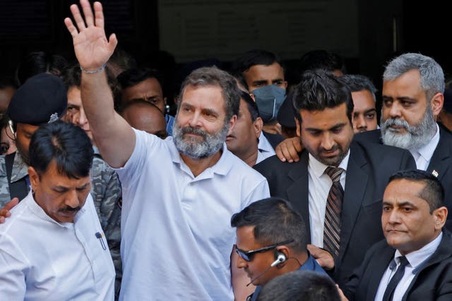 <p>File photo: Rahul Gandhi, a senior leader of India’s main opposition Congress party, waves as he leaves a court</p>