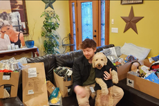 Idaho murder victim’s boyfriend poses with surviving dog and new niece