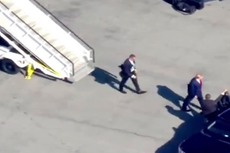 Moment Donald Trump exits plane upon arrival in New York ahead of arraignment