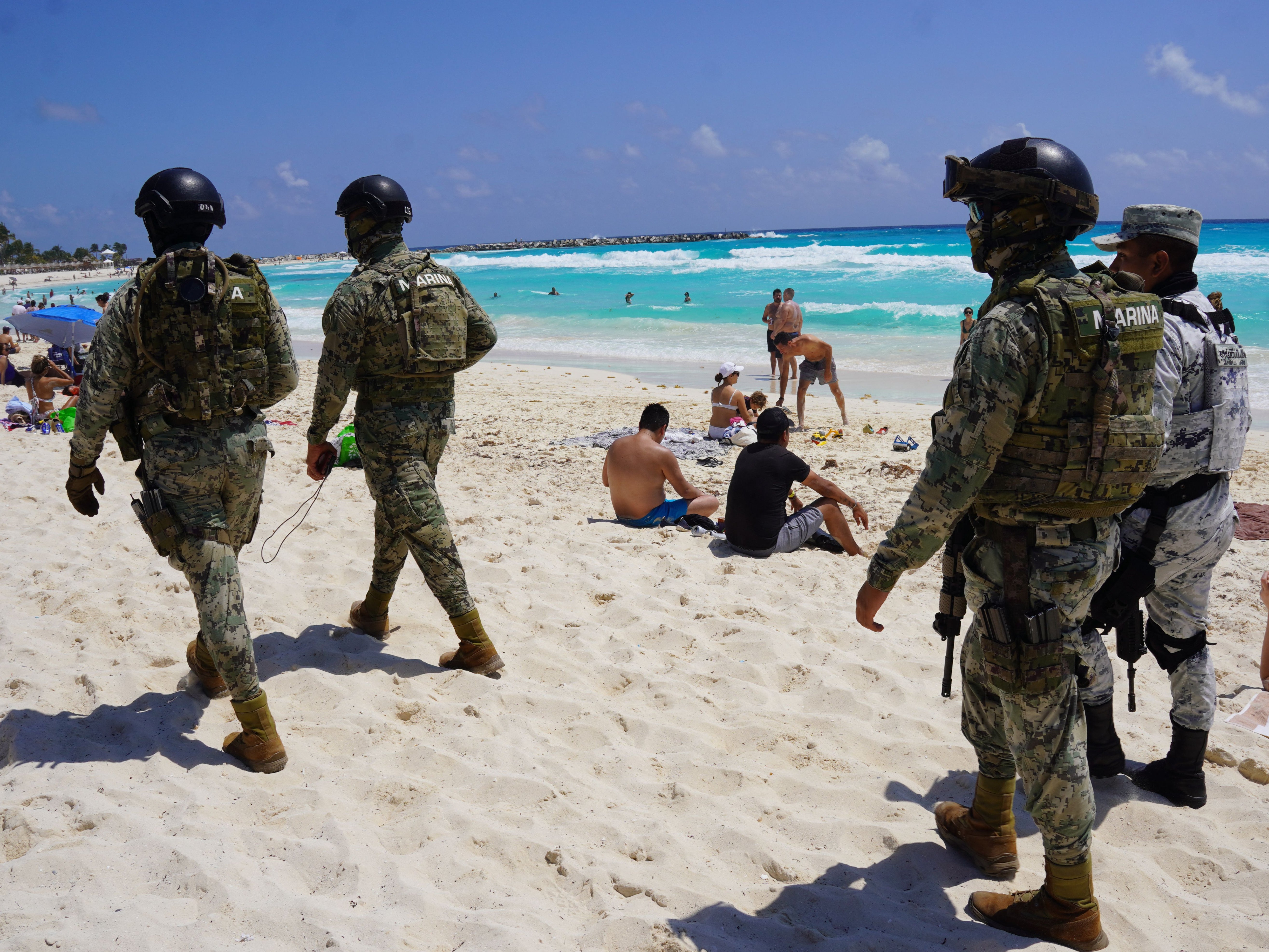 File photo: Members of the Mexican Navy and National Guard patrol the tourist beach area of Cancun, Quintana Roo state, Mexico on 18 March 2023