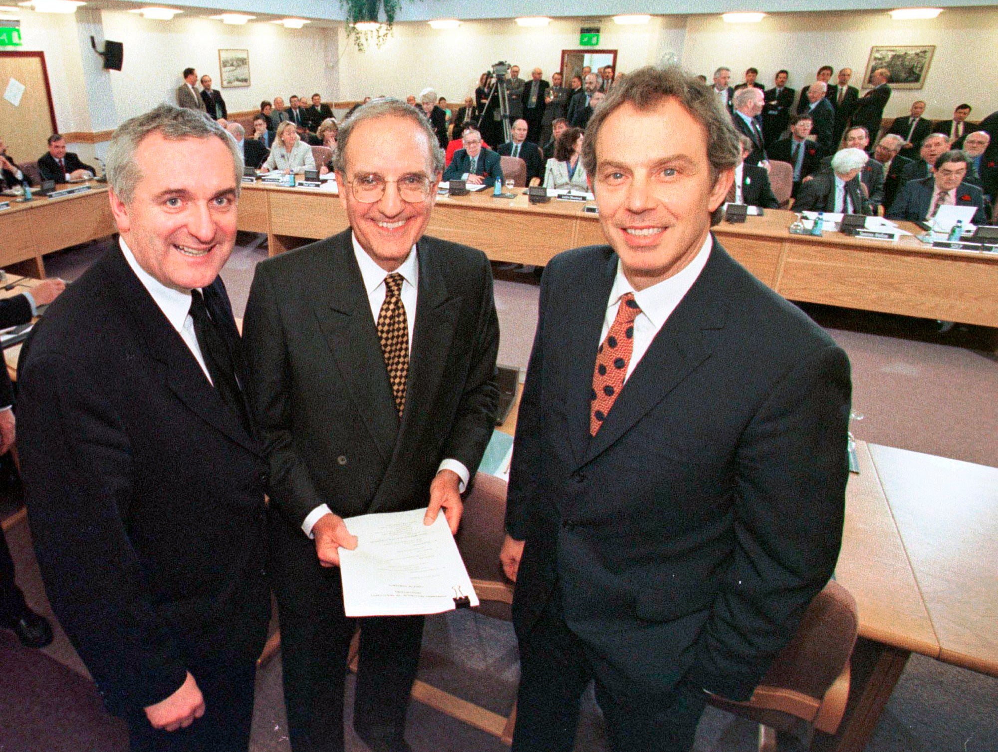 Tony Blair, the US senator George Mitchell, and Bertie Ahern after the signing of the Agreement