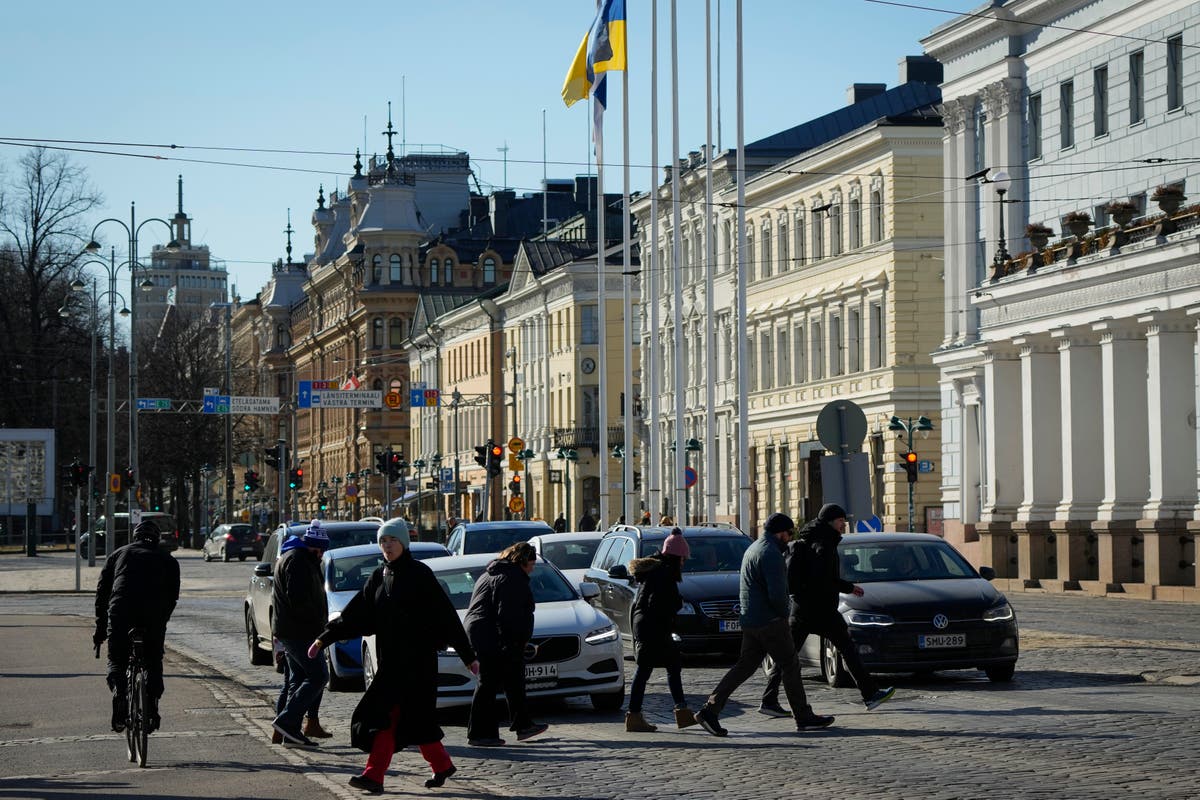 NATO flags raised in Helsinki as Finland joins alliance