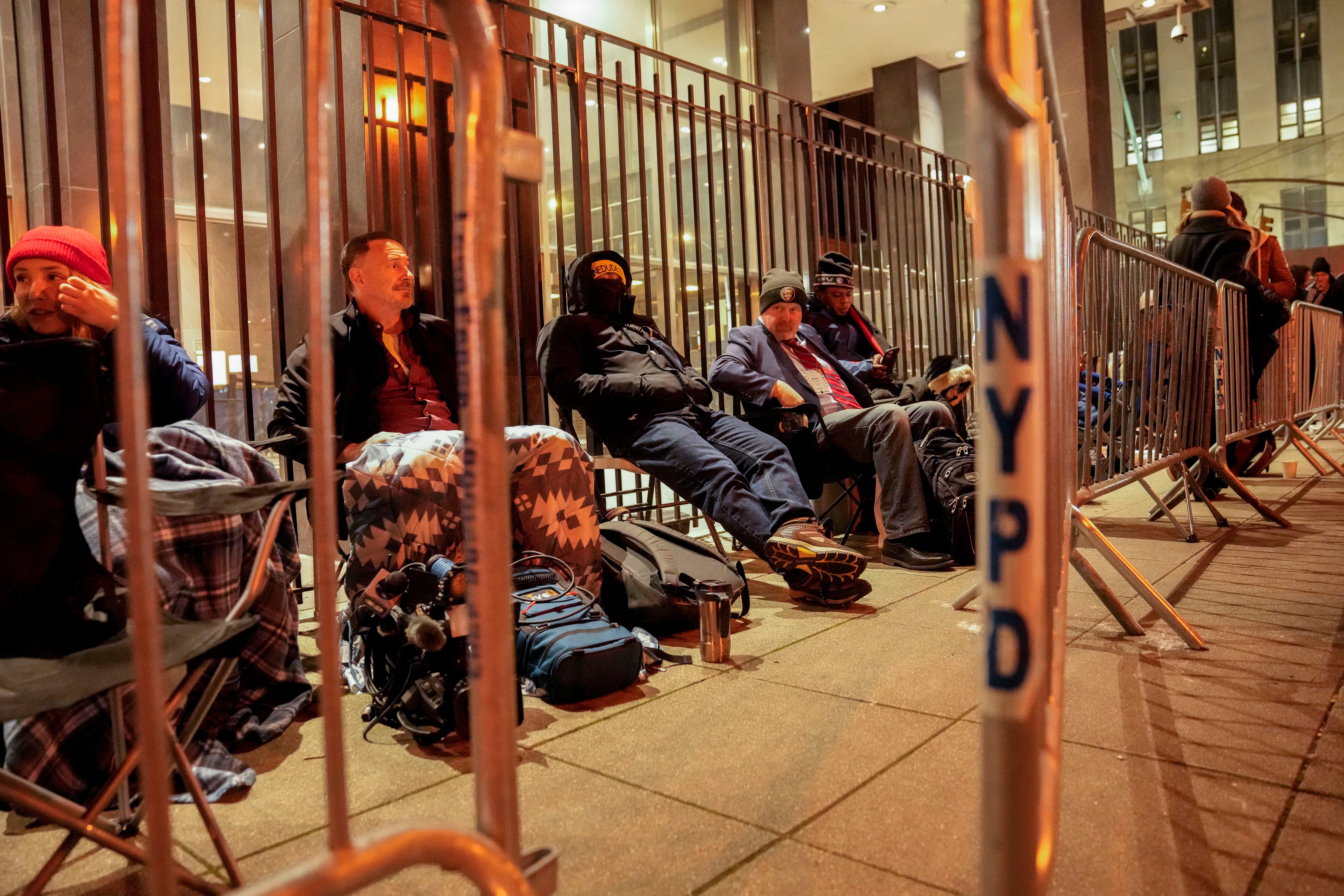 A line for court access is formed outside Manhattan Criminal Court overnight