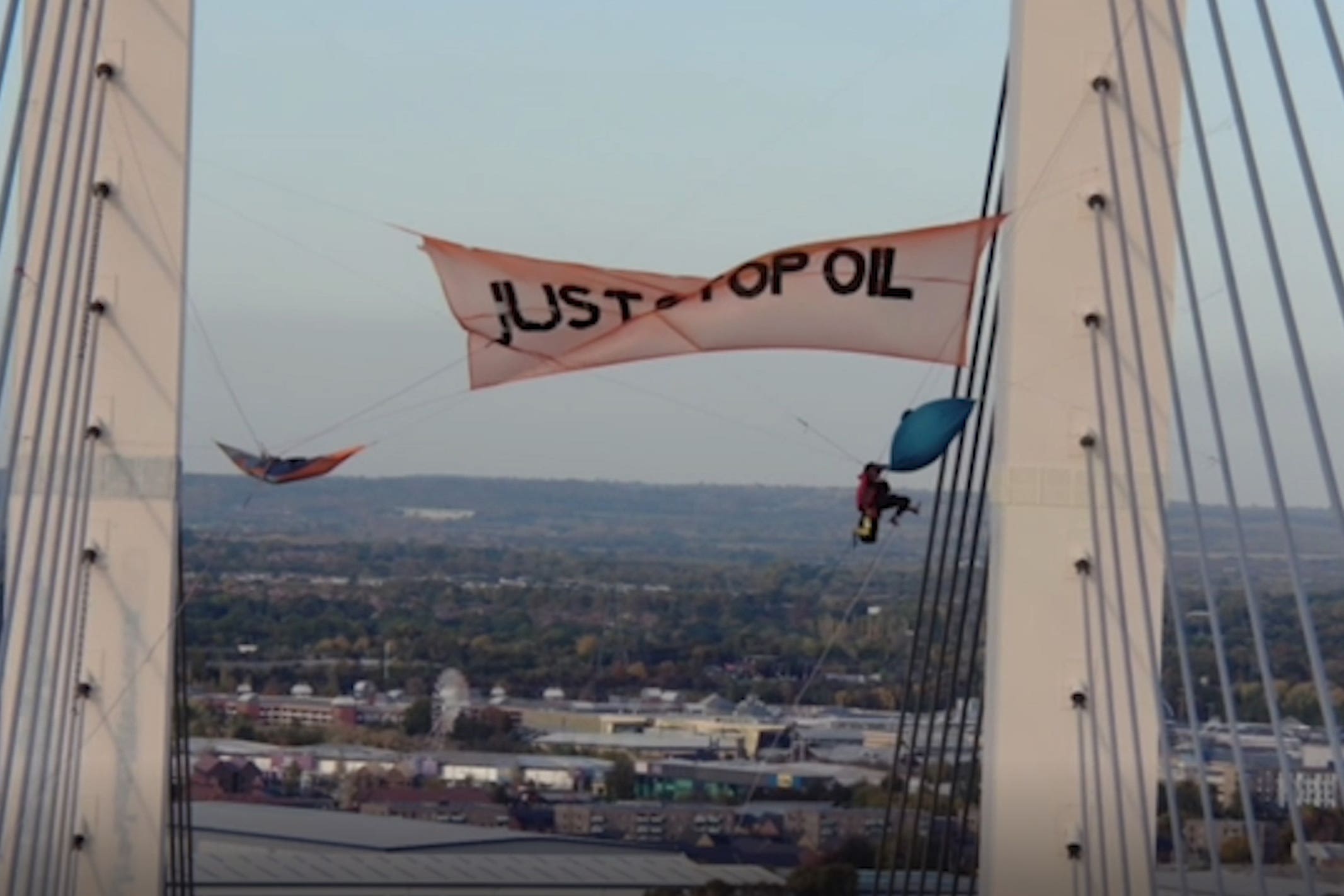 Two Just Stop Oil protesters, Morgan Trowland and Marcus Decker, scaled a bridge on the Dartford Crossing