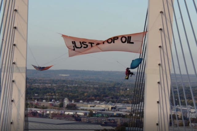 Two Just Stop Oil protesters, Morgan Trowland and Marcus Decker, scaled a bridge on the Dartford Crossing (Essex Police/PA)