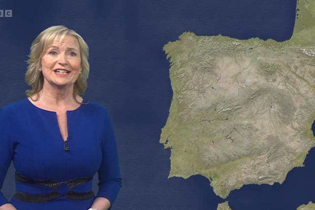 <p>Carol Kirkwood speaking in front of a map of Spain</p>