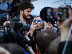 Counter-protest forces Marjorie Taylor Greene to flee Trump arraignment as she compares him to Mandela