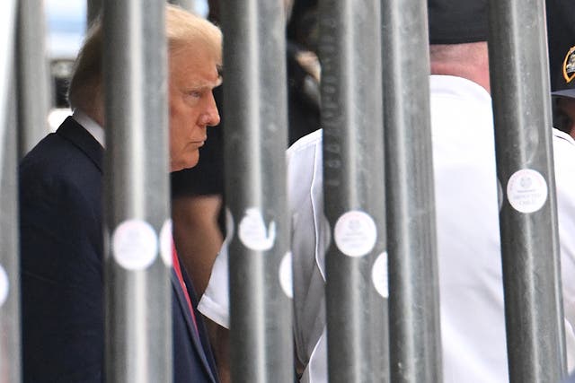 <p>Donald Trump outside of the Manhattan courthouse where he was formally indicted on Tuesday </p>