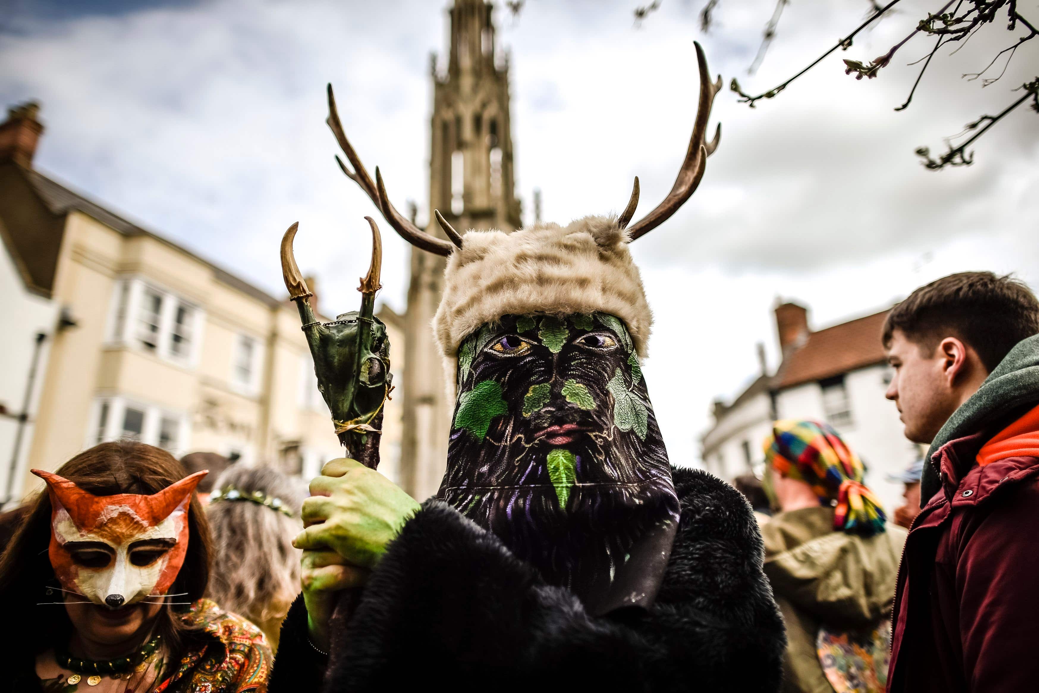 A man is dressed as a Green Man during the Glastonbury Beltane celebrations in Somerset (Ben Birchall/PA)