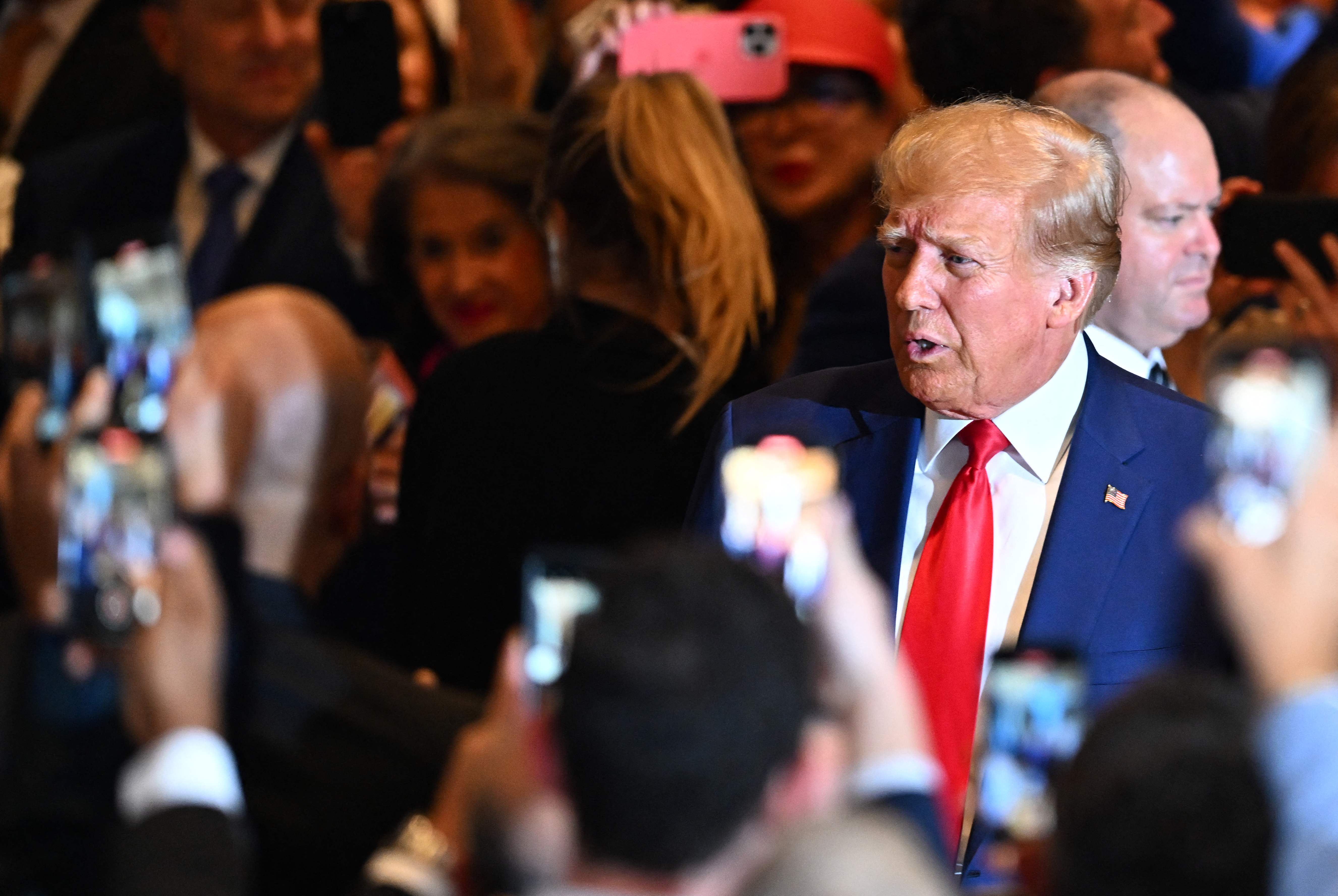 Former US president Donald Trump arrives to speak during a press conference following his court appearance over an alleged 'hush-money' payment, at his Mar-a-Lago estate in Palm Beach, Florida, on April 4, 2023