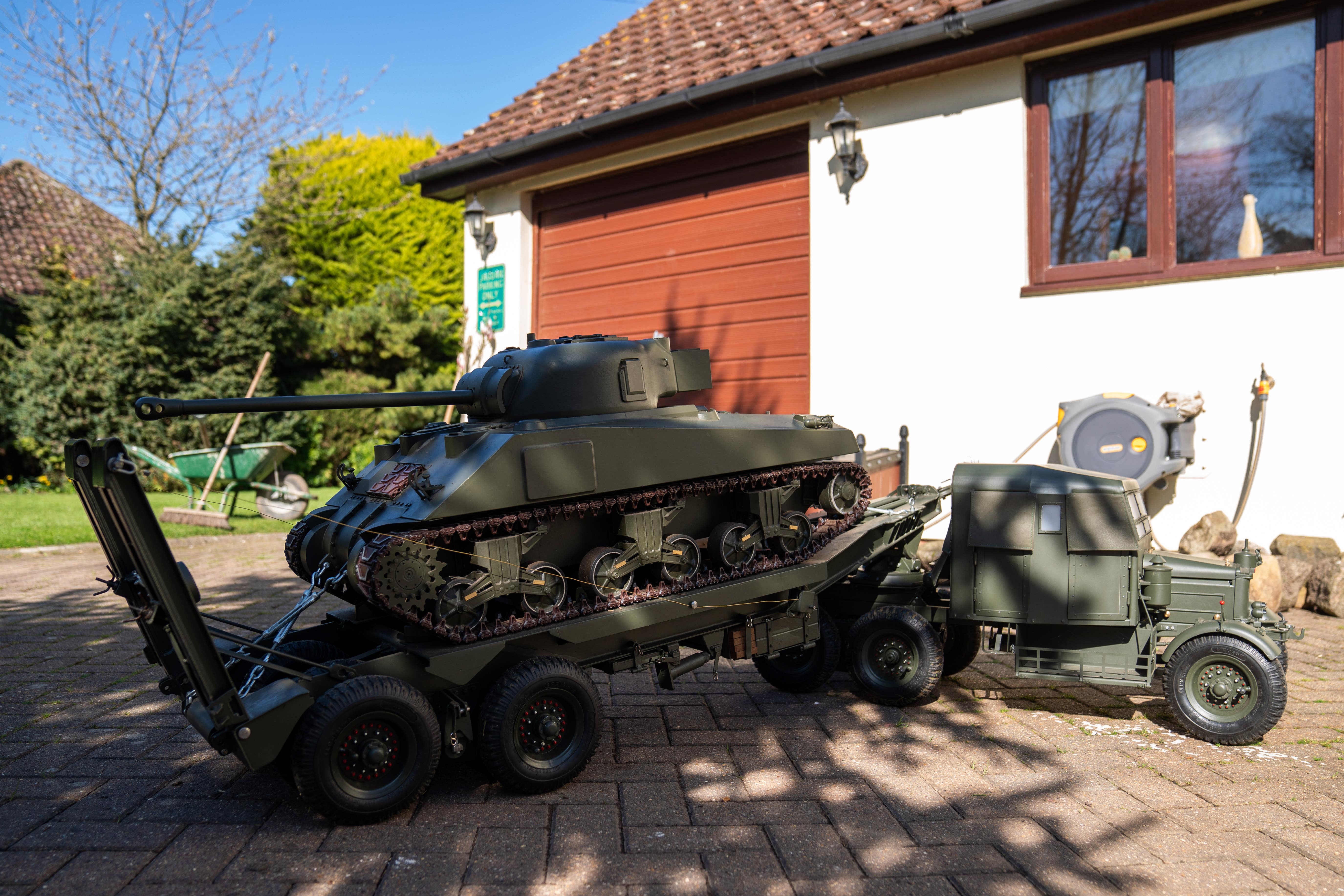 Roland Hopper, 79, built the scale model tank and transporter as he was bored in retirement (Joe Giddens/PA)