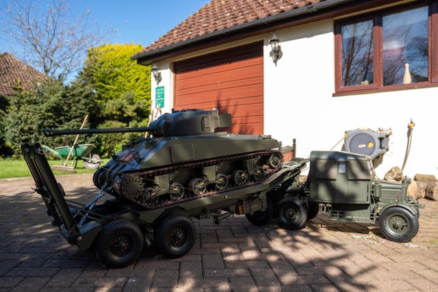 Roland Hopper, 79, built the scale model tank and transporter as he was bored in retirement (Joe Giddens/PA)