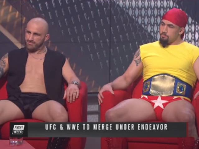 <p>Alexander Volkanovski (left) and Robert Whittaker dress as WWE legends</p>
