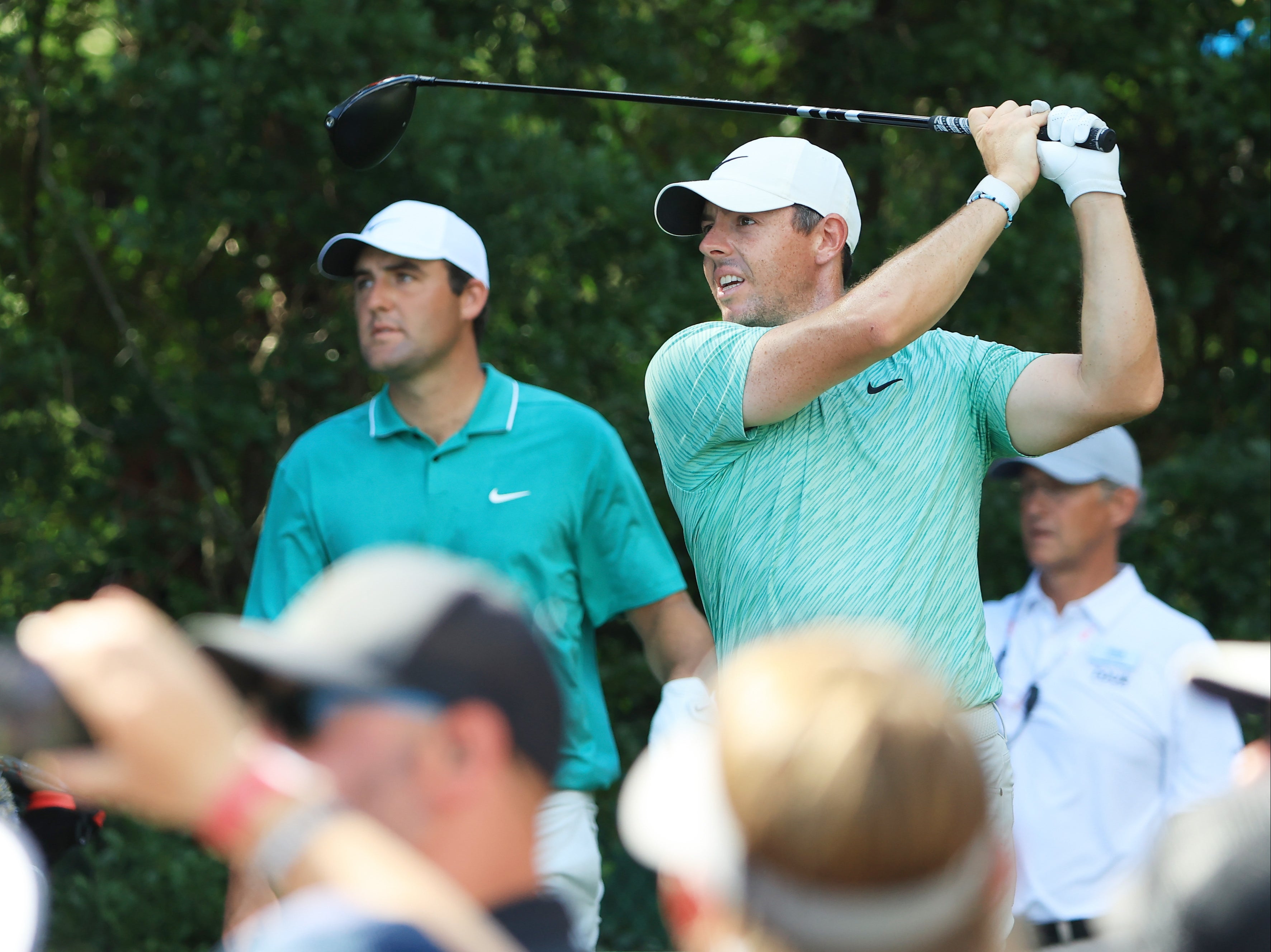 Rory McIlroy (right) will hope to complete a career grand slam as Scottie Scheffler (left) defends his Masters crown