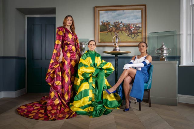 Ahead of The Randox Grand National, The Jockey Club has partnered with coveted British designer Richard Quinn to transform the racing silks of previous Grand National Winners into three high fashion couture looks, which will be auctioned off for charity during Ladies Day (Terry Donnelly/PA)
