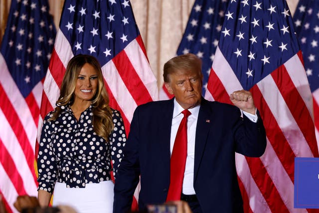 <p>Former US president Donald Trump, joined by former US first lady Melania Trump, arrives to speak at the Mar-a-Lago Club in Palm Beach, Florida, on 15 November 2022</p>