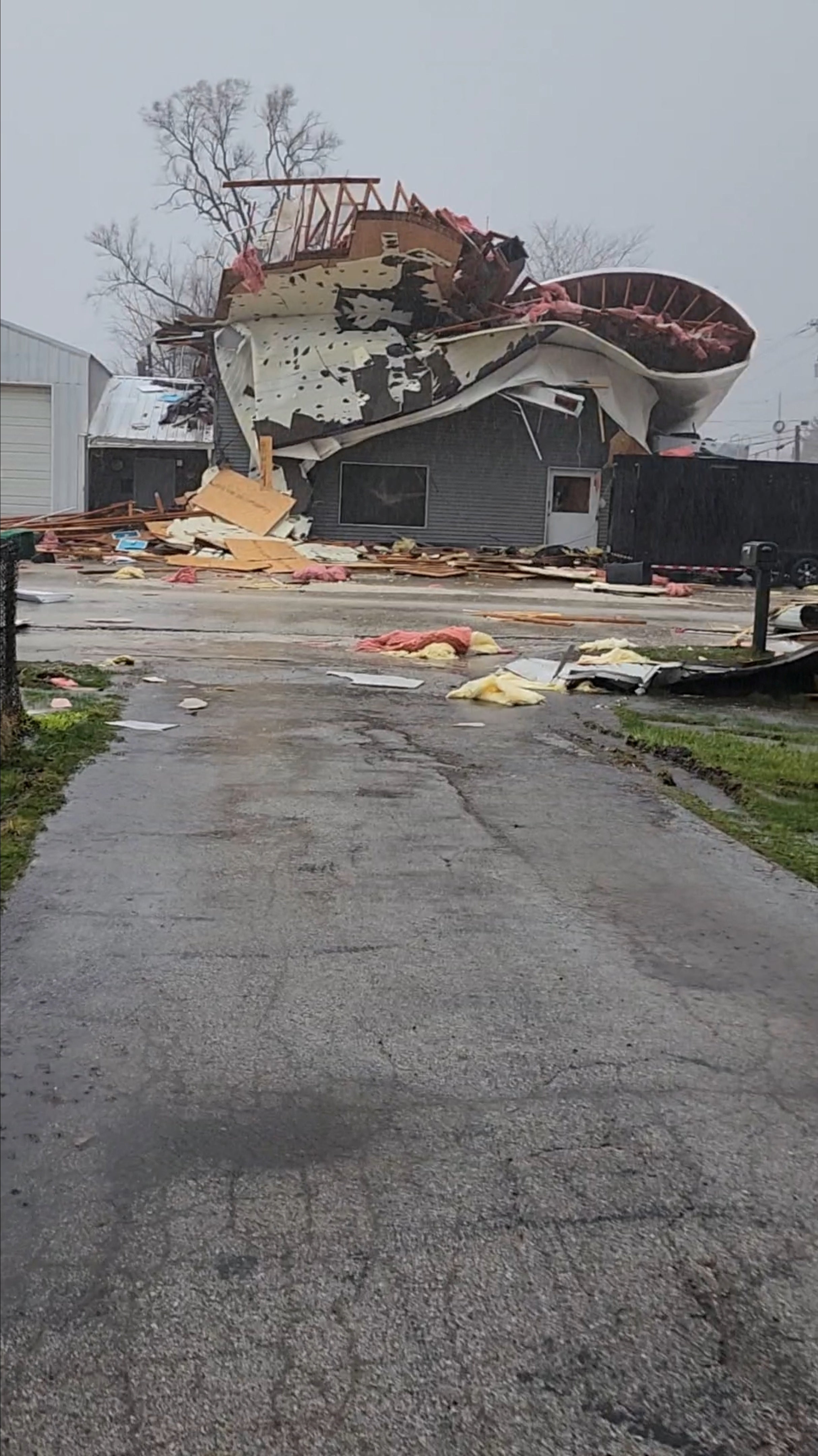 A view of damage to a building caused by a tornado, in Colona, Illinois on 4th April