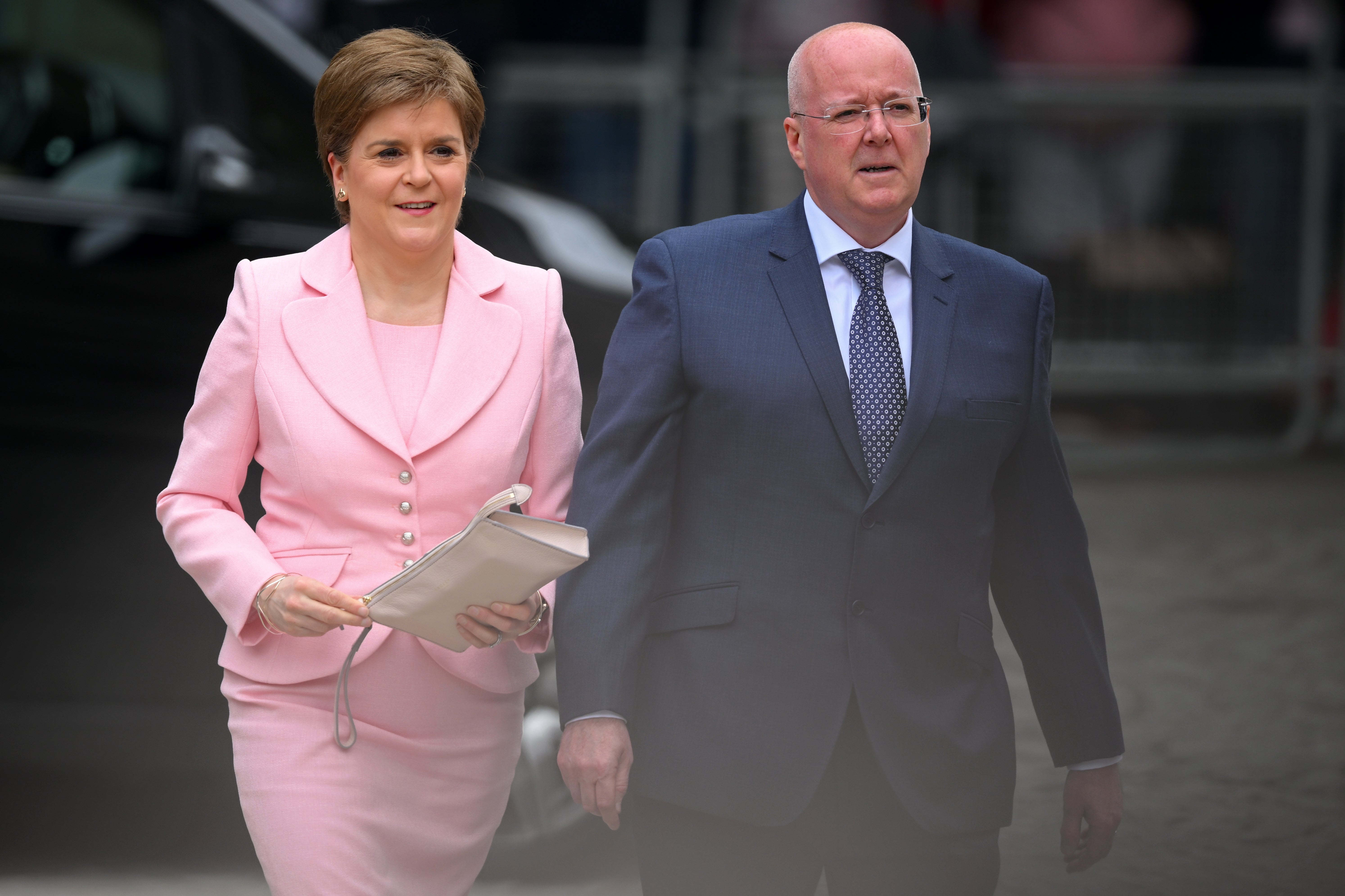Mr Murrell, pictured with his wife Ms Sturgeon, was released without charge