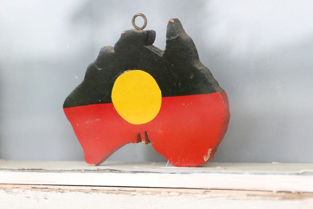 <p>FILE: A depiction of the Australian Aboriginal Flag is seen on a window sill in Sydney</p>