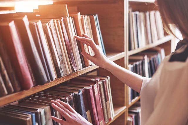 Unison said higher education workers including library staff are to vote on whether to take industrial action (Alamy/PA)