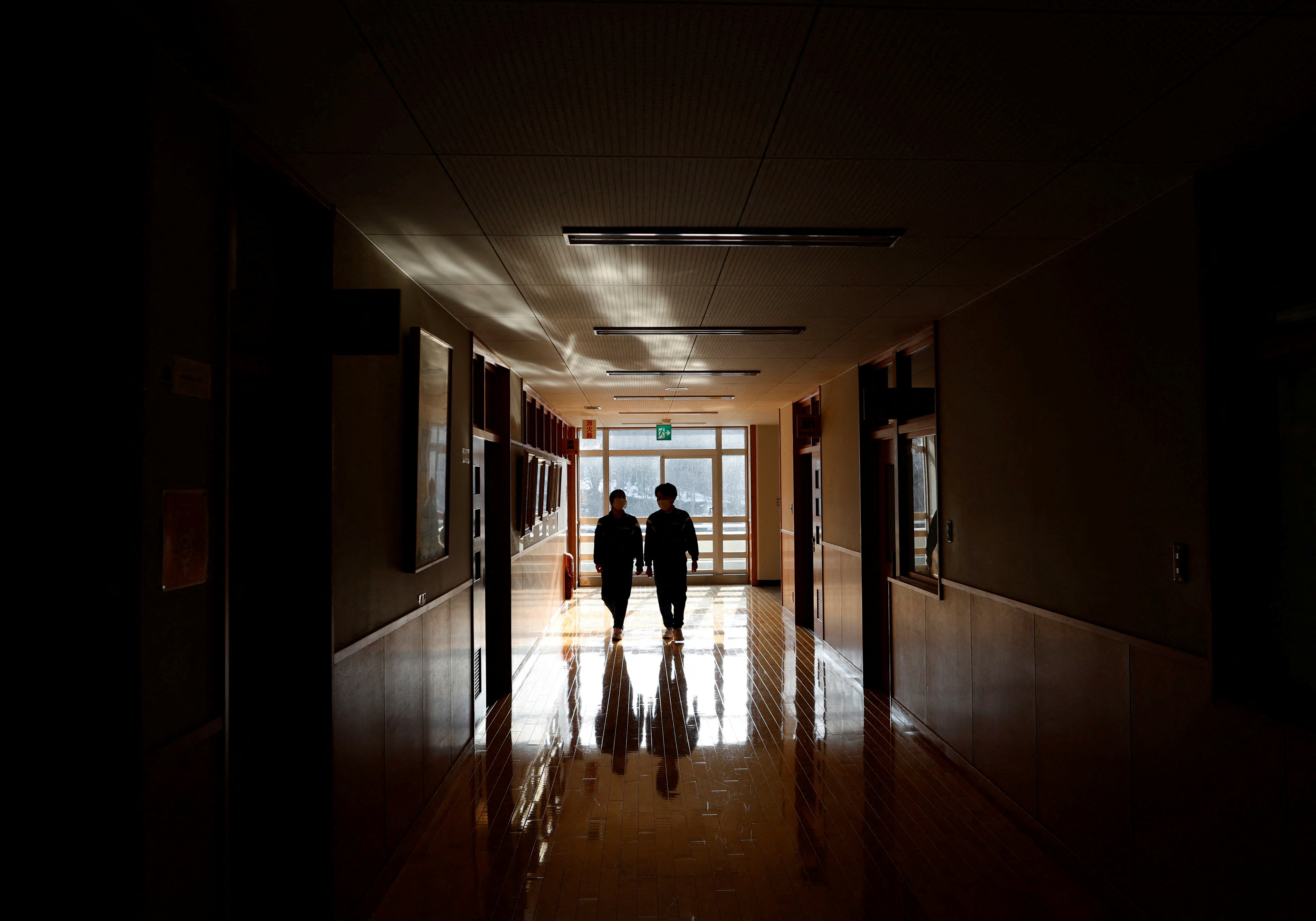 Empty feeling: Eita and Aoi walk along the corridor of their school