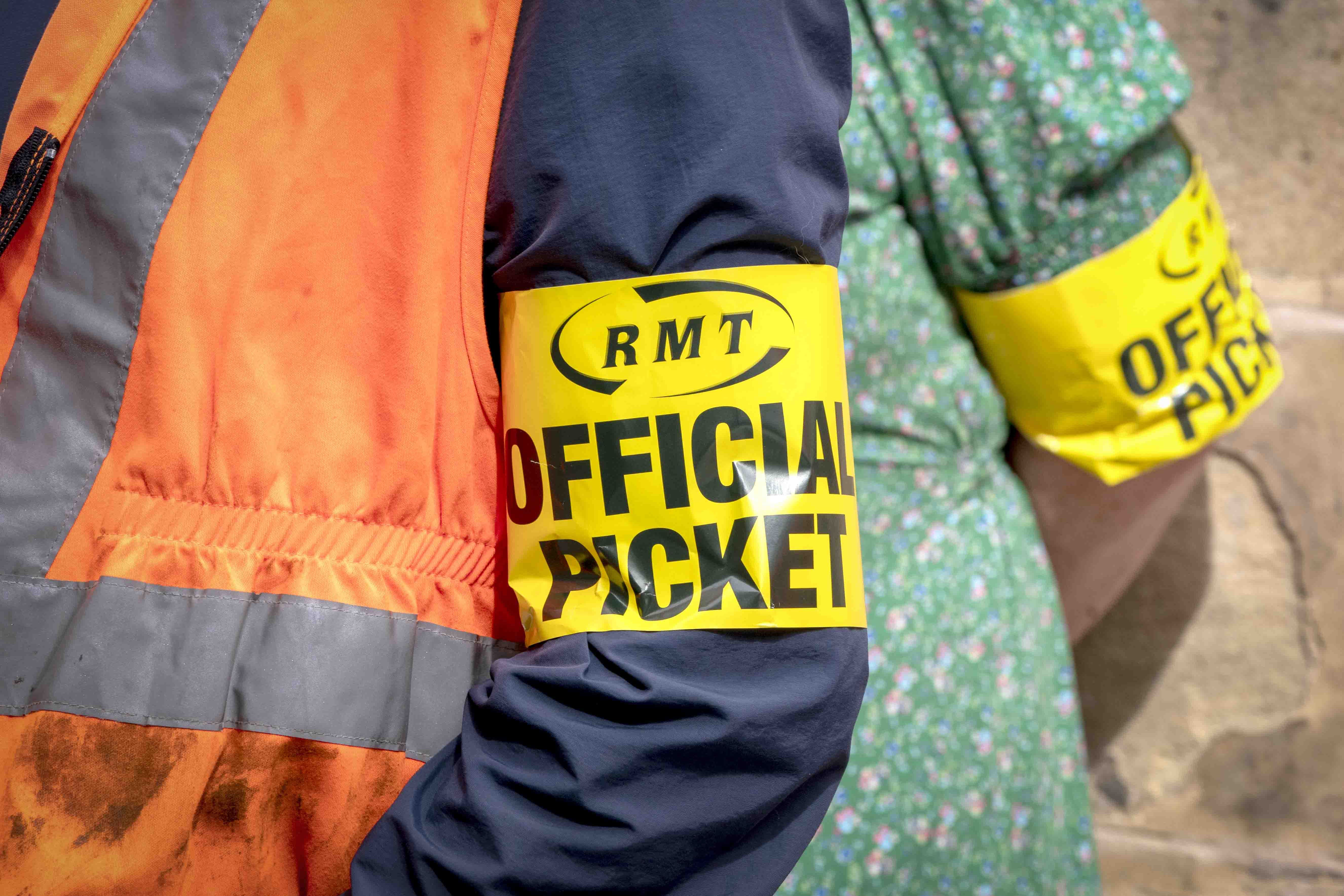 Members of the RMT are being balloted in the next few weeks for a further six-month mandate to take strike action if the row is not resolved (PA)