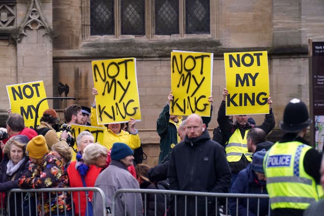 Protesters holding ‘Not My King’ placards (Owen Humphreys/PA)