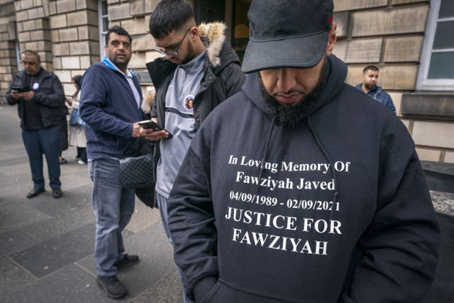 A family member wears a sweatshirt in memory of Fawziyah Javed outside the High Court in Edinburgh (Jane Barlow/PA)