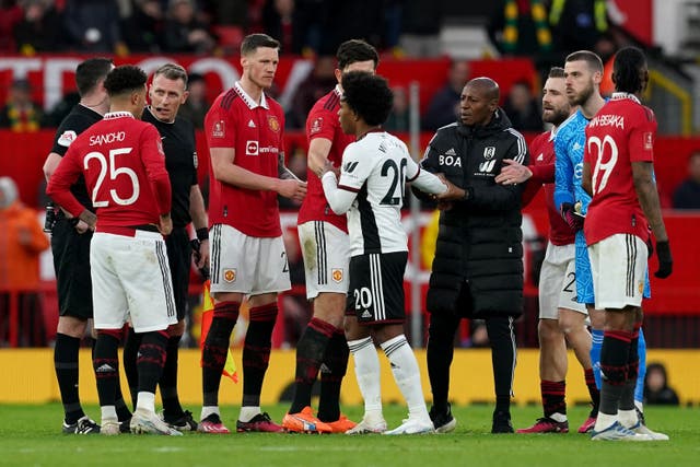Manchester United have been fined after their players surrounded referee Chris Kavanagh in the FA Cup win over Fulham (Martin Rickett/PA)