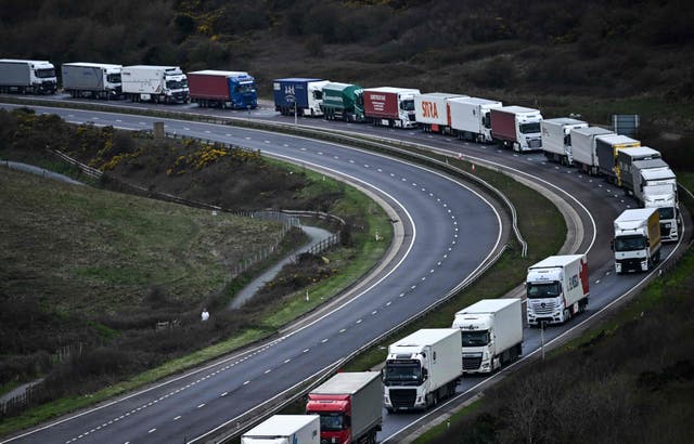 <p>Freight lorries, HGVs (heavy goods vehicles) and cars queue on the A20 road towards the Port of Dover in April earlier this year </p>