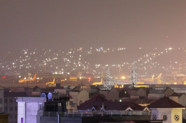 <p>Planes are seen on the tarmac at the airport in Kabul late on August 30, 2021, hours ahead of a US deadline to complete its frenzied withdrawal from Afghanistan</p>