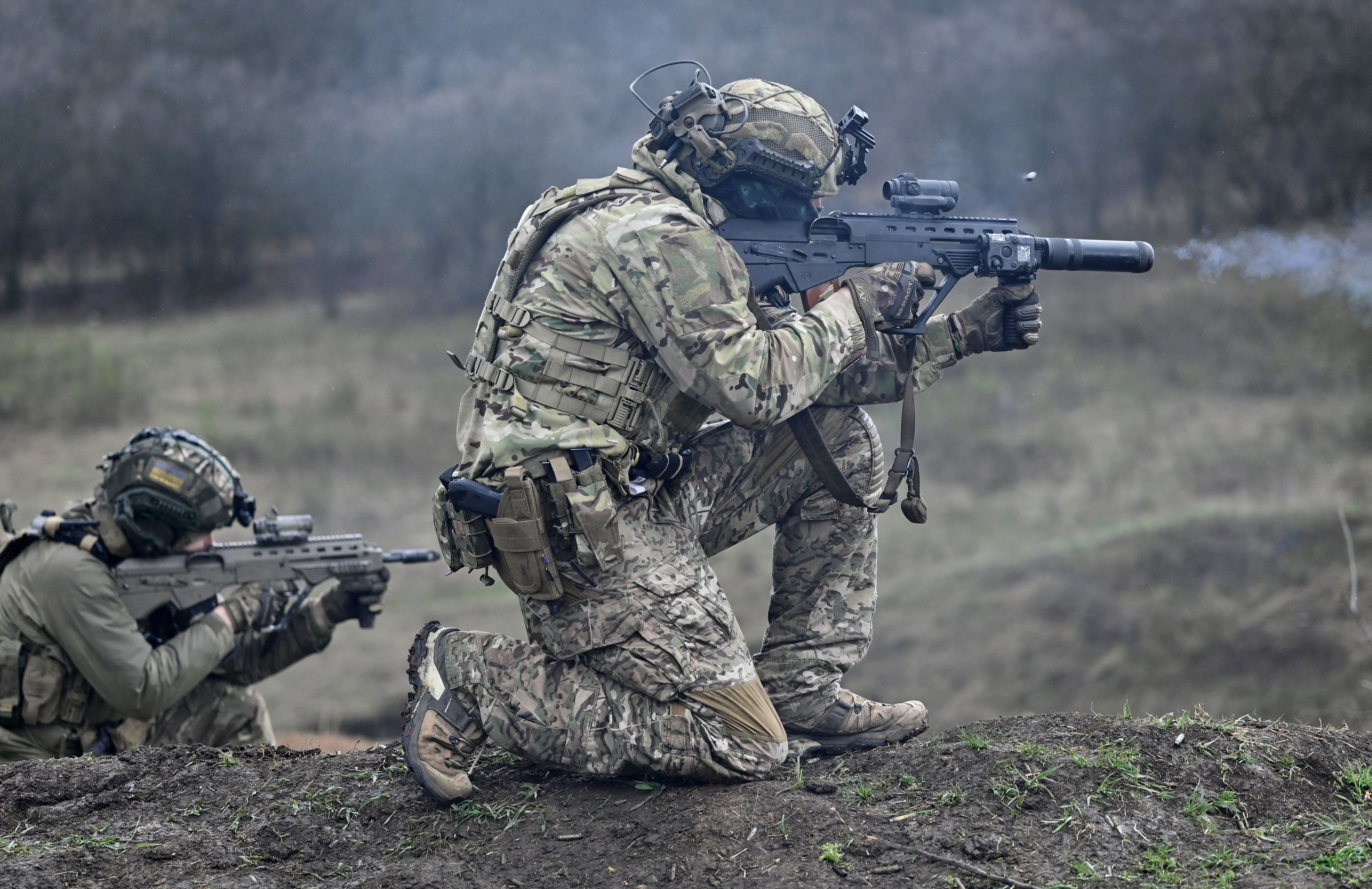 <p>A Ukrainian Special Forces serviceman (R) fires a Ukrainian made Malyuk assault rifle during a training exercise in Donetsk region amid the Russian invasion of Ukraine </p>