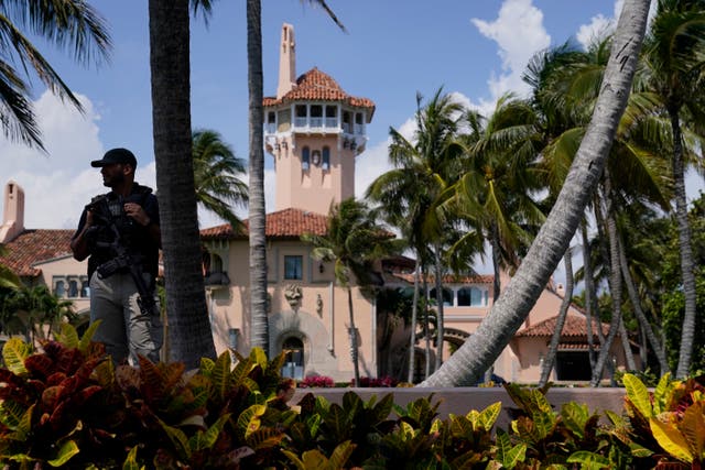 <p>A security guard stands on the perimeter of former President Donald Trump's Mar-a-Lago home, Monday, April 3, 2023, in Palm Beach, Fla.</p>