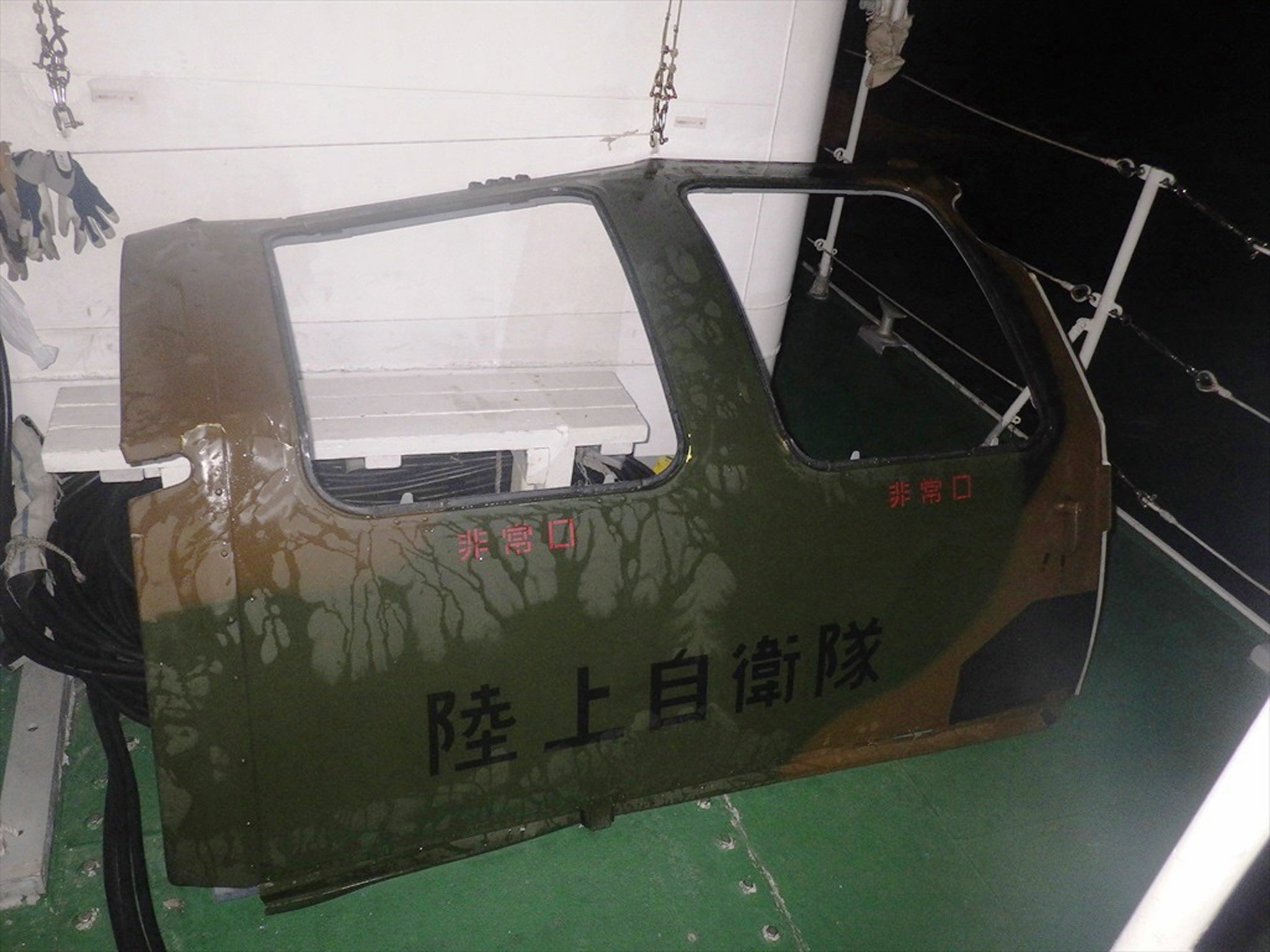 A part believed to be that of the missing helicopter in the sea off Miyako Island, Okinawa Prefecture, southwestern Japan