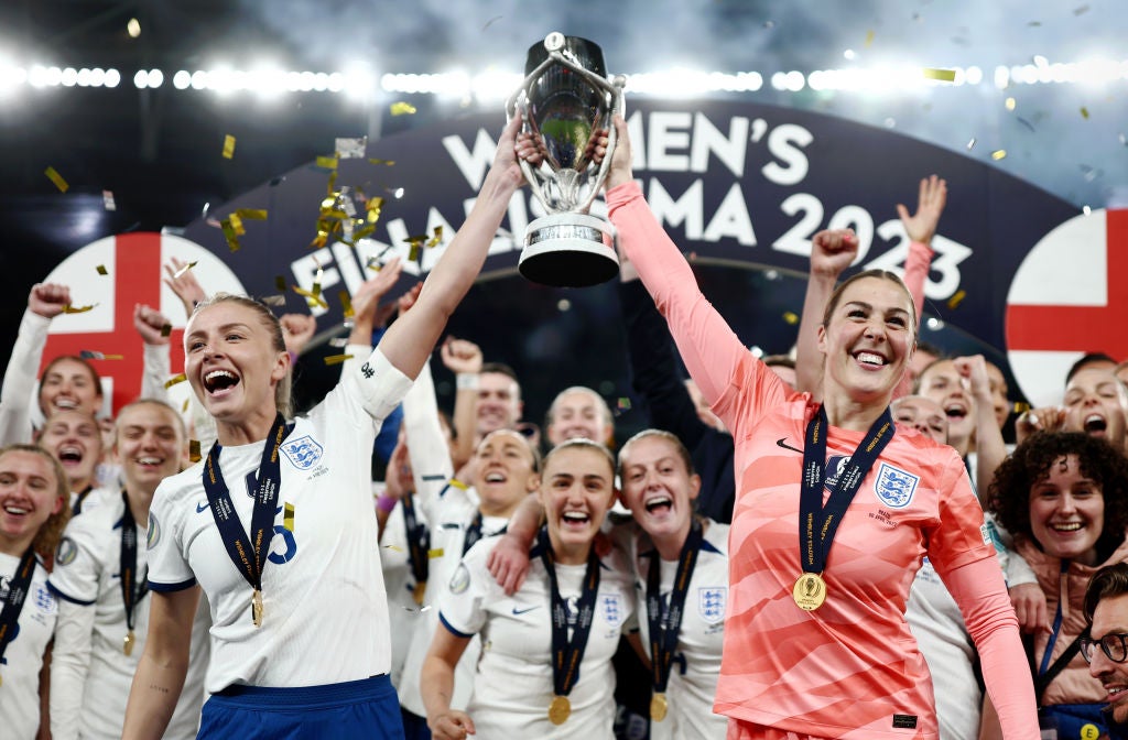 Captain Leah Williamson and goalkeeper Mary Earps lift the Finalissima trophy after England’s victory over and Brazil at Wembley on Thursday
