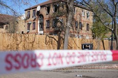 Teenager arrested on suspicion of murder after girl, 14, killed and five injured in flat fire