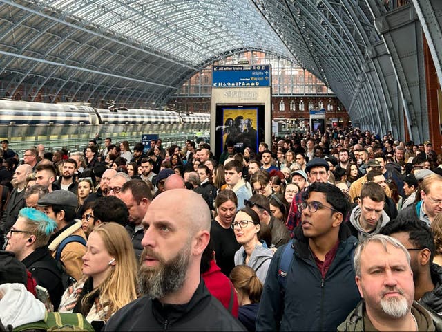 <p>Thousands of passengers were stuck in ‘chaotic’ queues at London St Pancras</p>