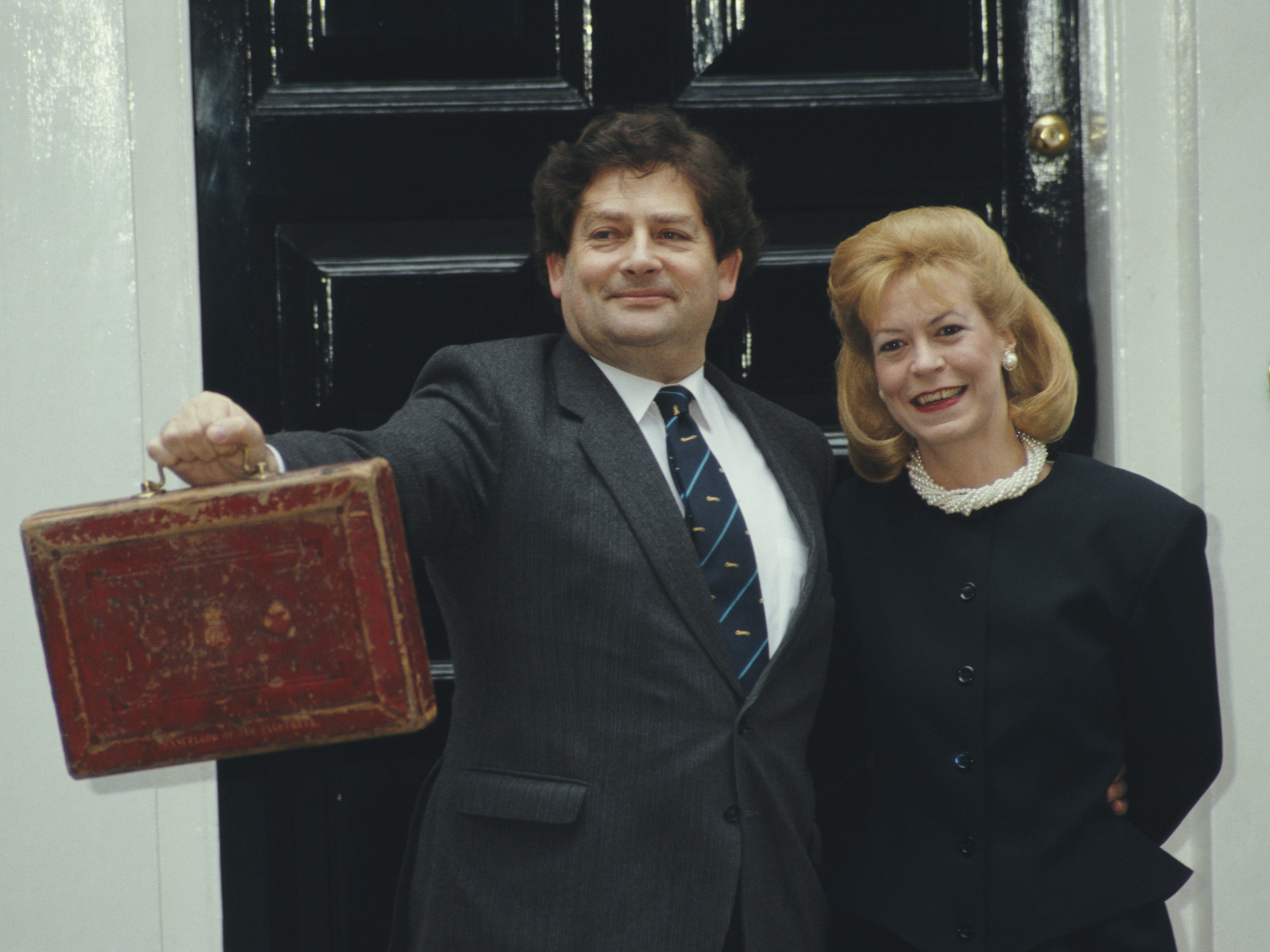 Nigel Lawson with his wife Therese Maclear outside 11 Downing Street on Budget Day in March 1987