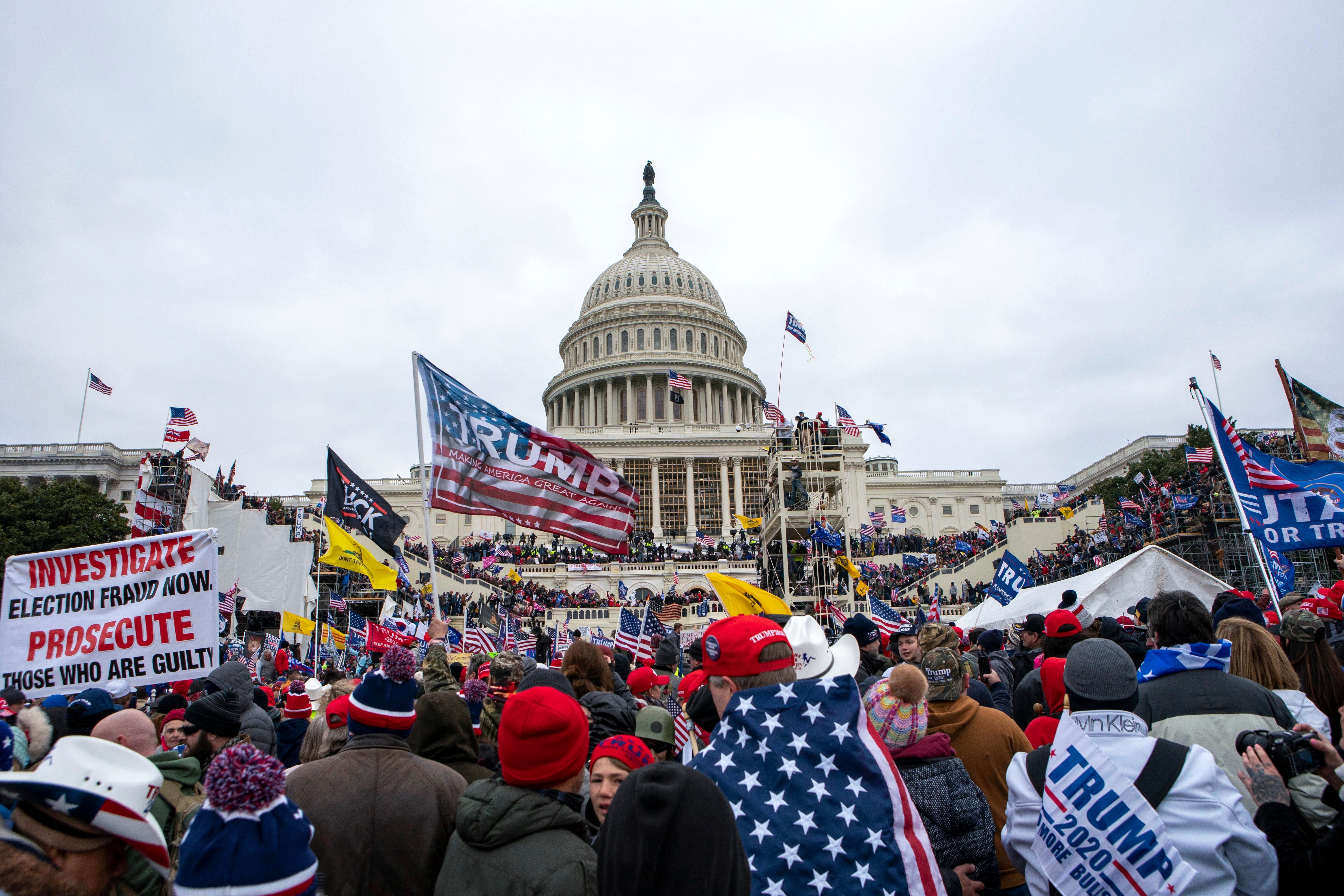 Insurrectionists loyal to President Donald Trump storm the USCapitol in Washington on 6 January 2021