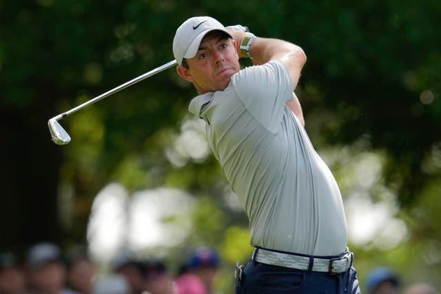 Rory McIlroy watches his tee shot on the fourth hole during the second round of the Masters (Mark Baker/AP)