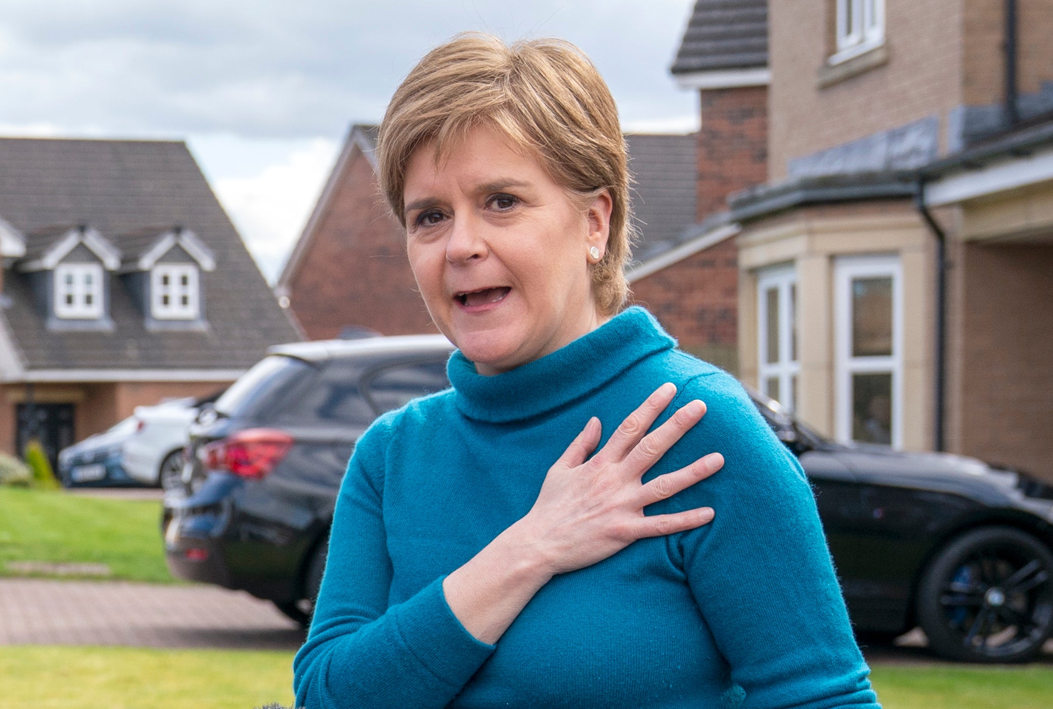 Nicola Sturgeon speaking to reporters outside her house near Glasgow