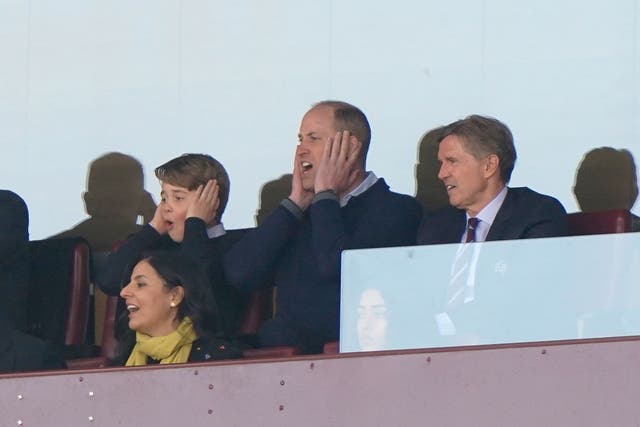 The Prince of Wales with Prince George of Wales and Aston Villa chief executive Christian Purslow (right) in the stands during the Premier League match at Villa Park (Joe Giddens/PA)