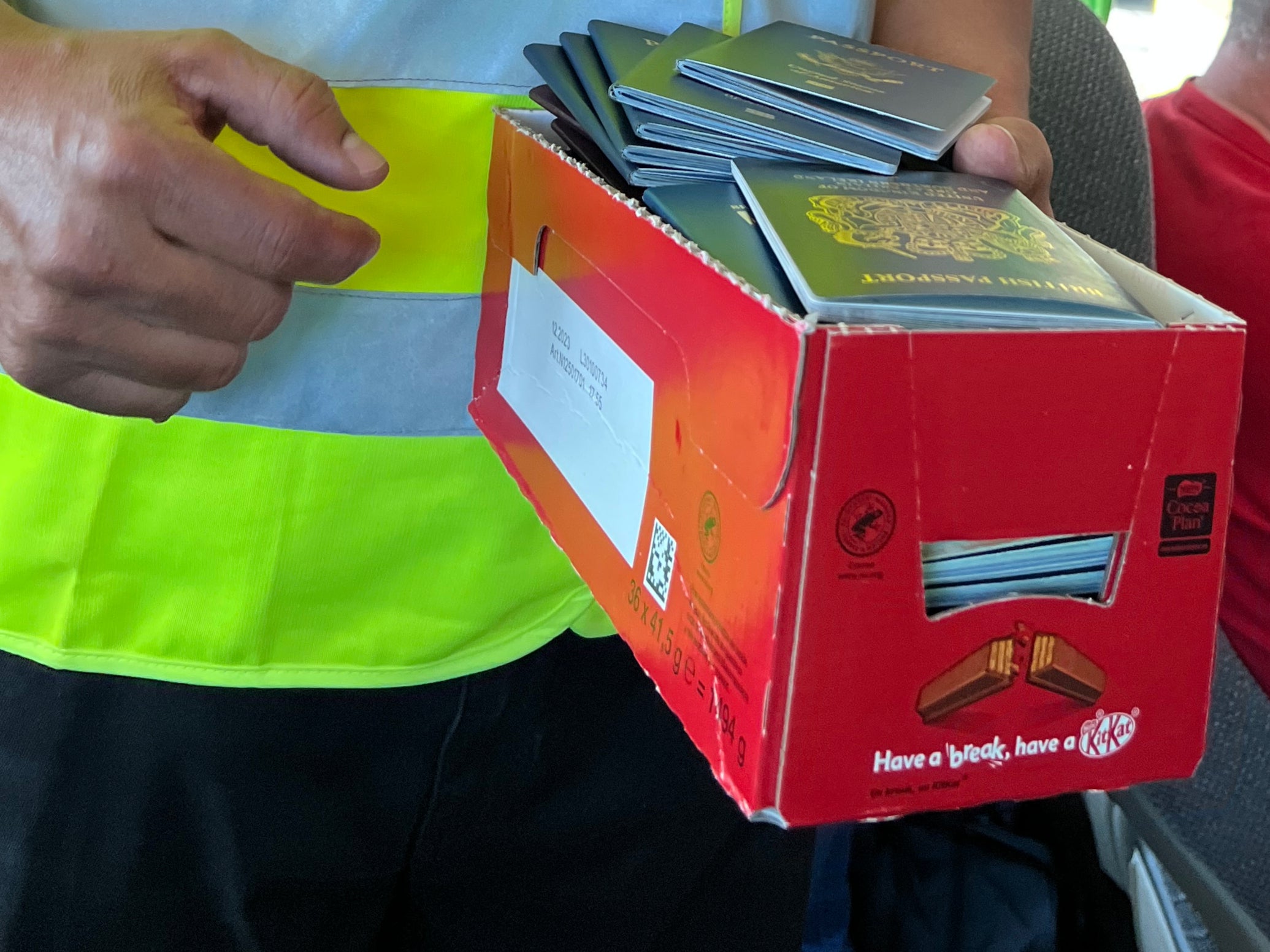 <p>Papers please: Passports being collected by an international bus driver</p>