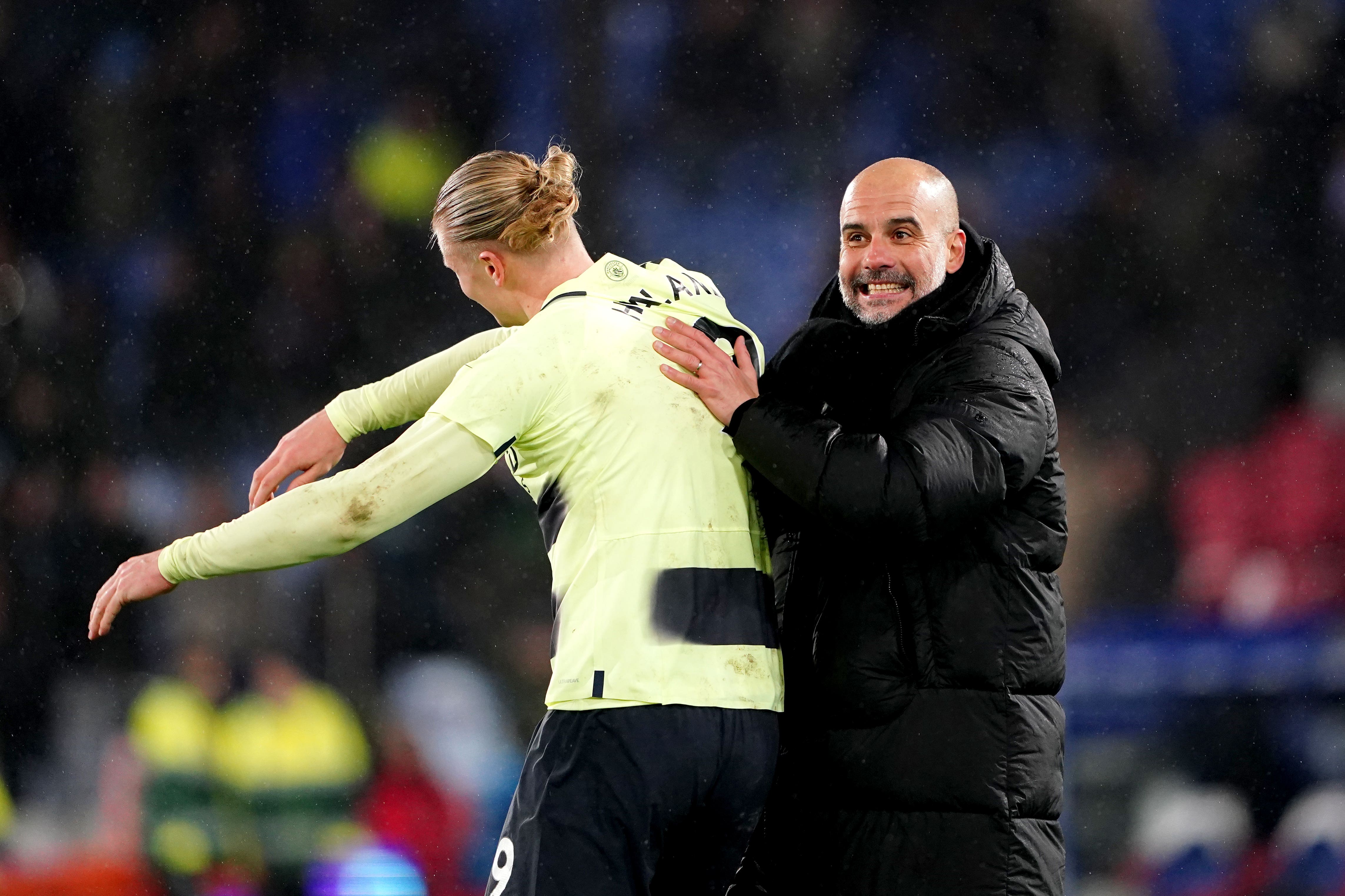 Erling Haaland (left) continues to impress his manager Pep Guardiola (PA)