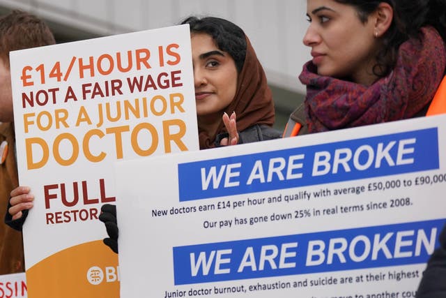 Striking NHS junior doctors on the picket line outside Queen Elizabeth hospital in Birmingham in March (Jacob King/PA)